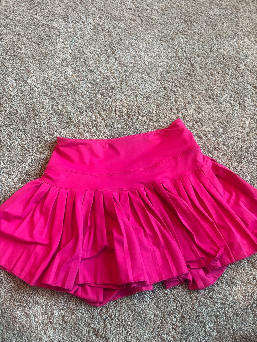 pink gold hinge tennis skirt